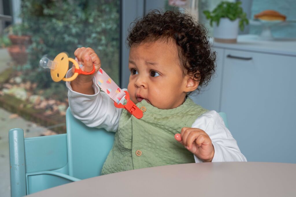 A colourful soother goes with a cheerful pacifinder