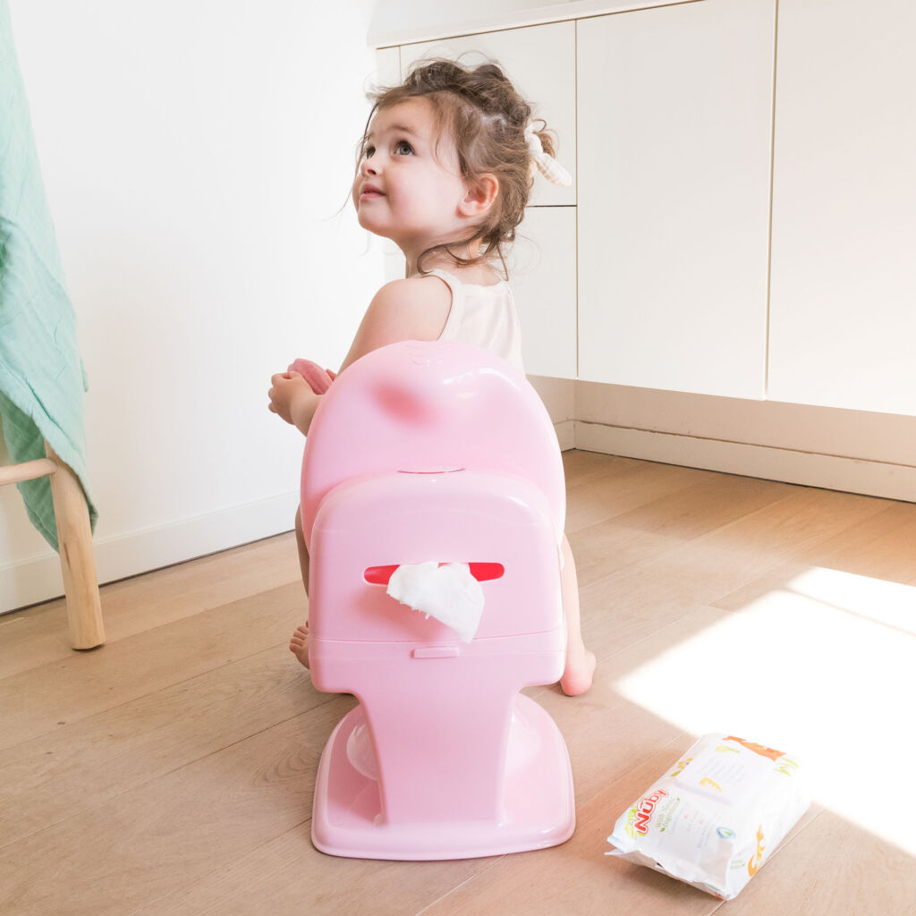 Nûby potty features a convenient compartment for storing wipes